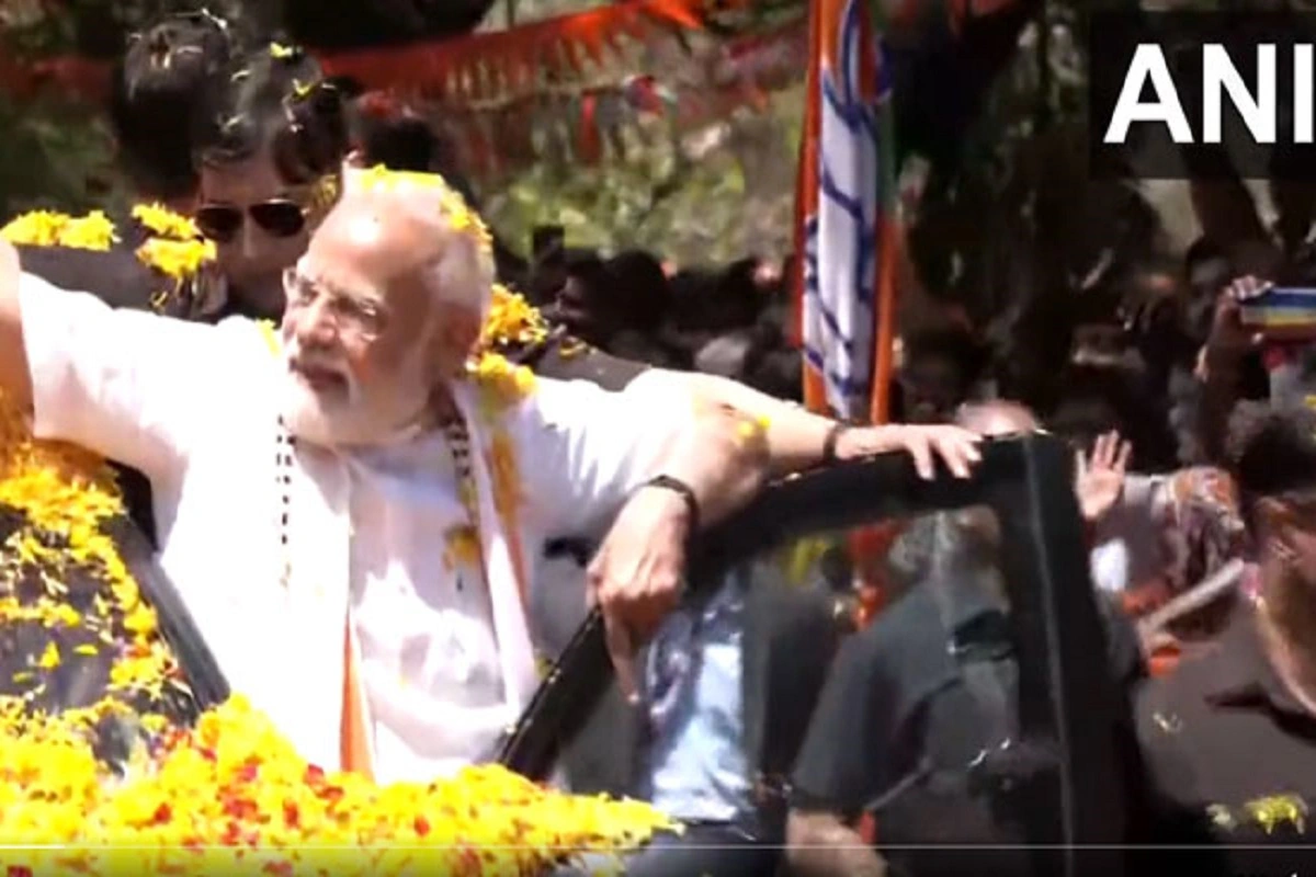 Enthusiastic Modi Throws Flower Petals Back At Cheering Crowd At Road-Show In Poll-Bound Karnataka