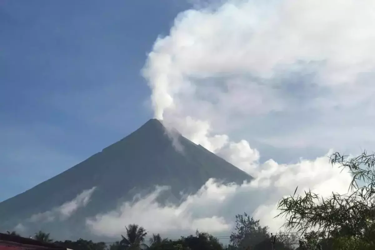 Thousands Of Filipinos Evacuated As Volcano Spews Ash & Rocks