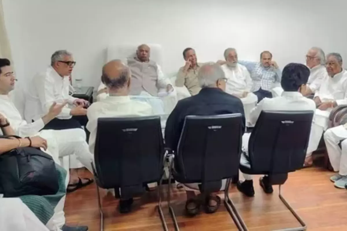 Congress President and Leader of Opposition in Rajya Sabha Mallikarjun Kharge, along with others during a meeting , in New Delhi