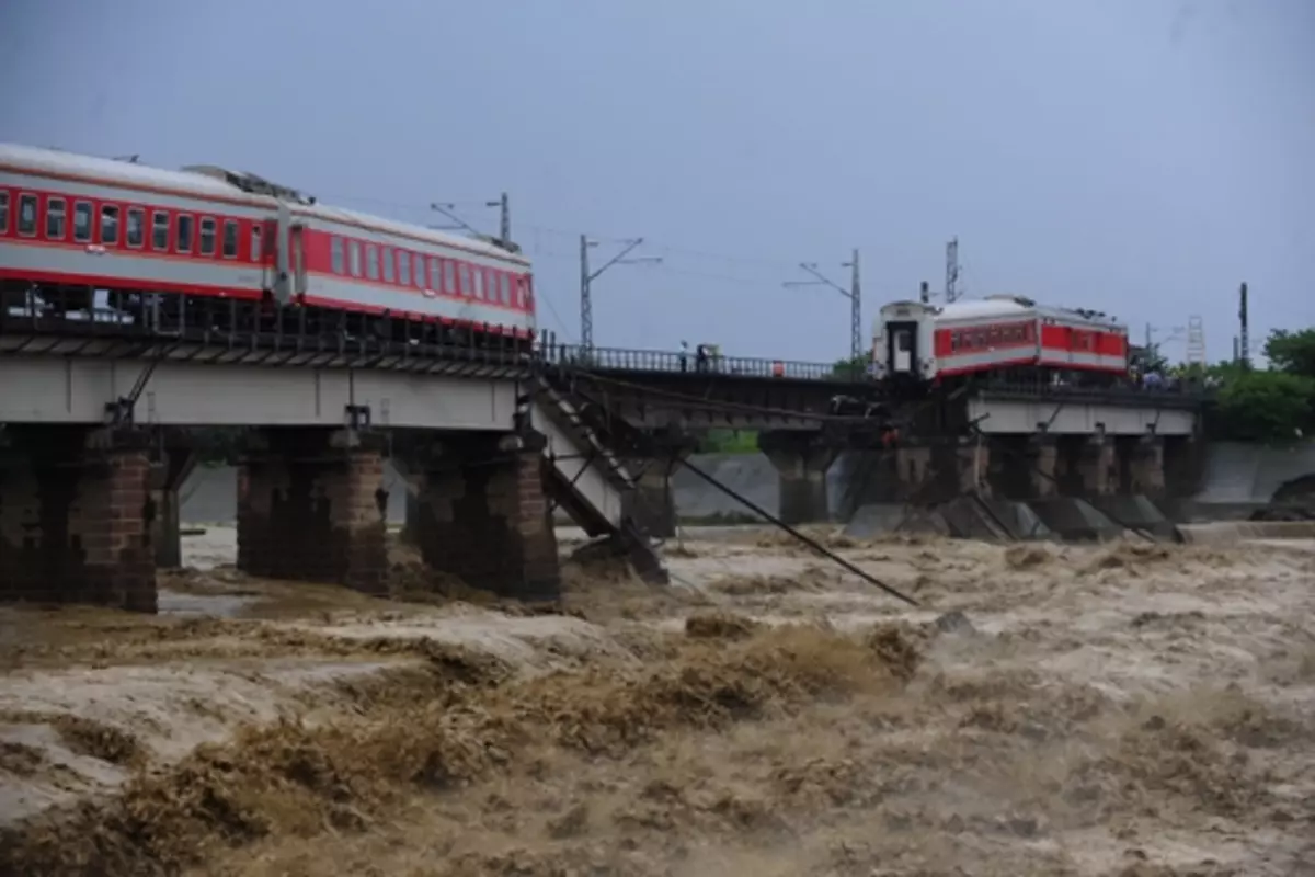 Heavy Rain Causes A Railway Bridge In China To Partially Collapsed