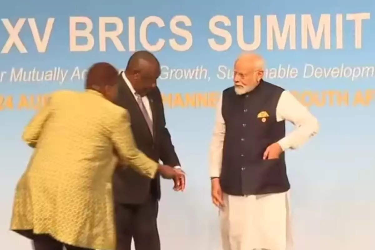 PM Modi’s Respectful Gesture: Picks Up Dropped Tricolor At BRICS Event , Watch Video