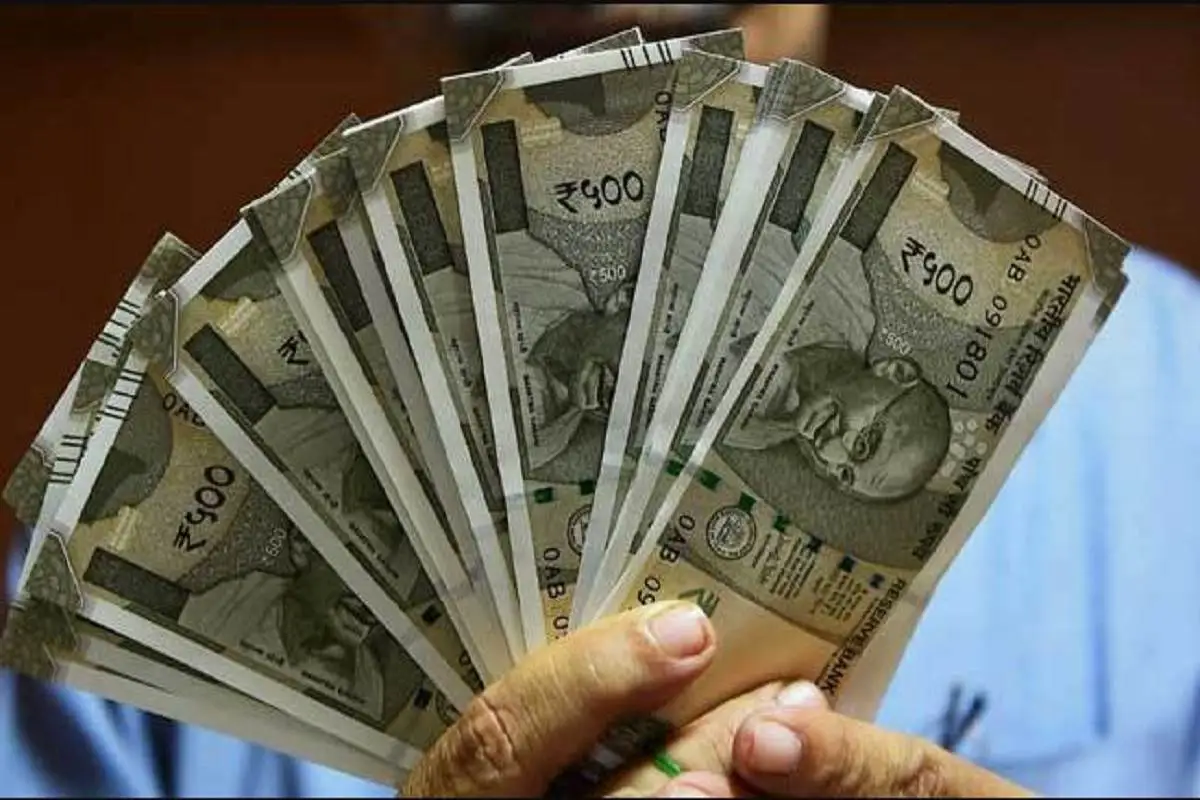 Rupee Drops 9 Paise To Settle At a Record Low Of 83.22 Against The US Dollar