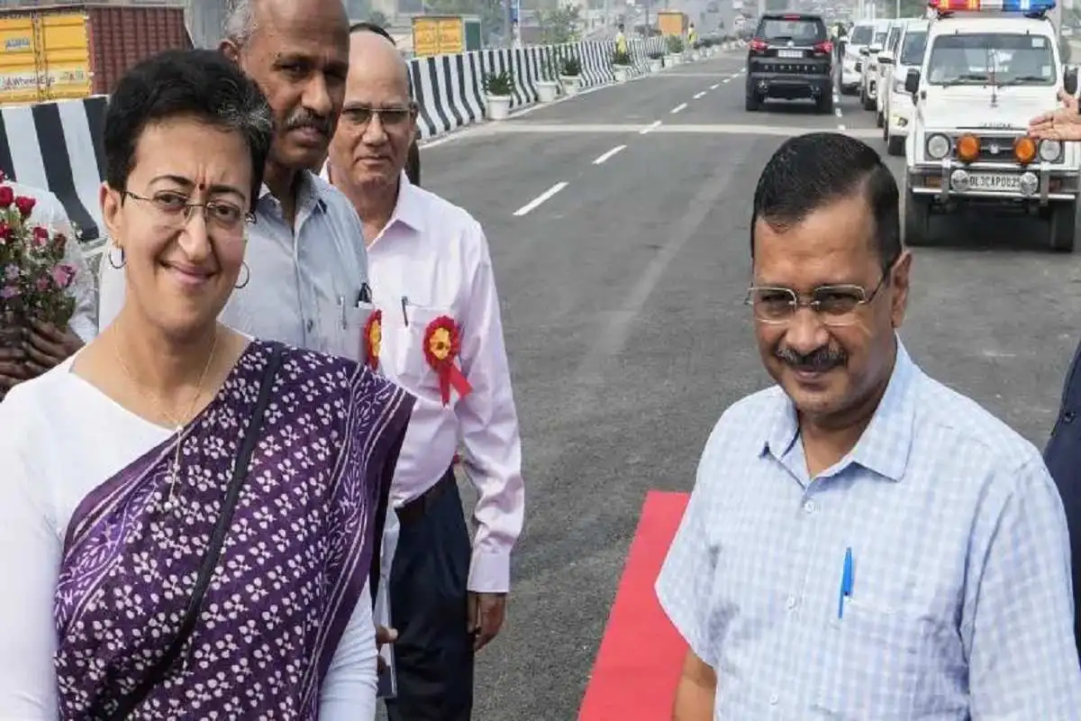 Arvind Kejriwal, the chief minister of Delhi, and Atishi Singh, the minister of Delhi Education and PWD