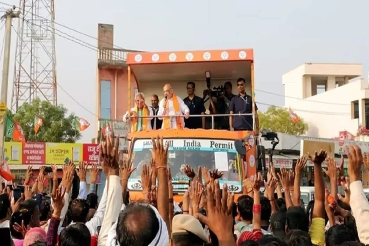In Rajasthan, Amit Shah barely makes it out before his “chariot” hits a power cord