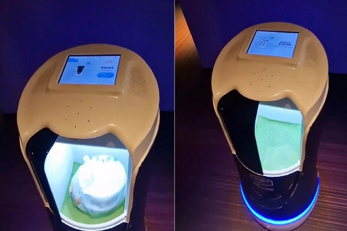 Travel Vlogger Amazed as Robot Delivers Food to His China Hotel Room: A Futuristic Experience!