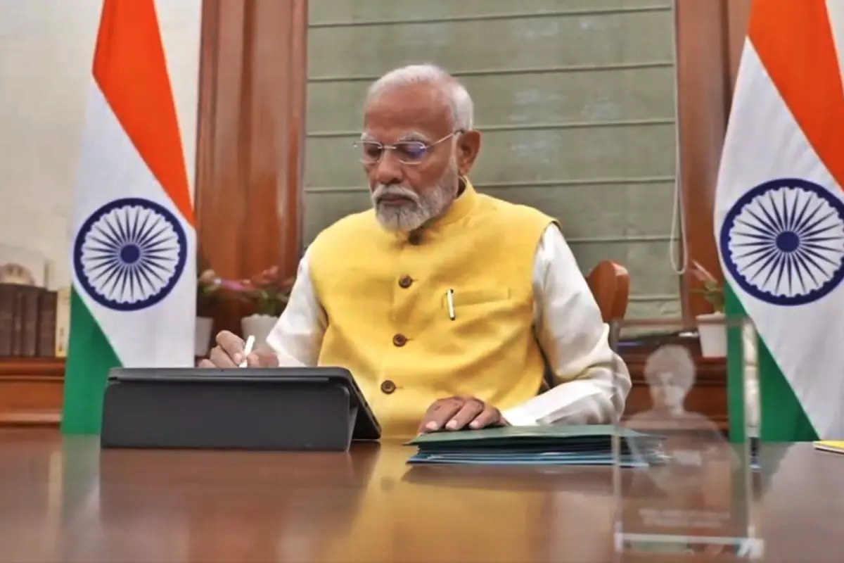 PM Modi Signs File Releasing Rs 20,000 Crore For 9.3 Crore Farmers Under PM Kisan Nidhi Scheme