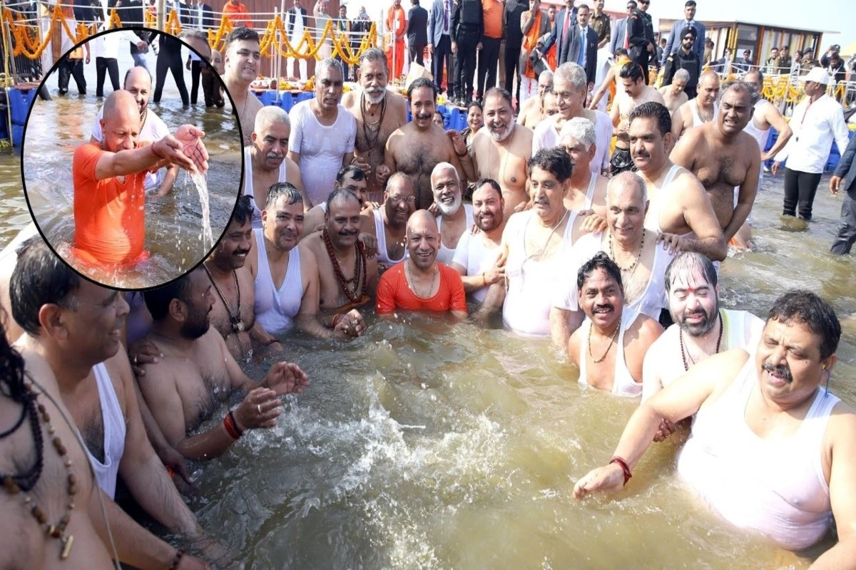 UP Cabinet Takes Holy Dip At Triveni Sangam During Maha Kumbh