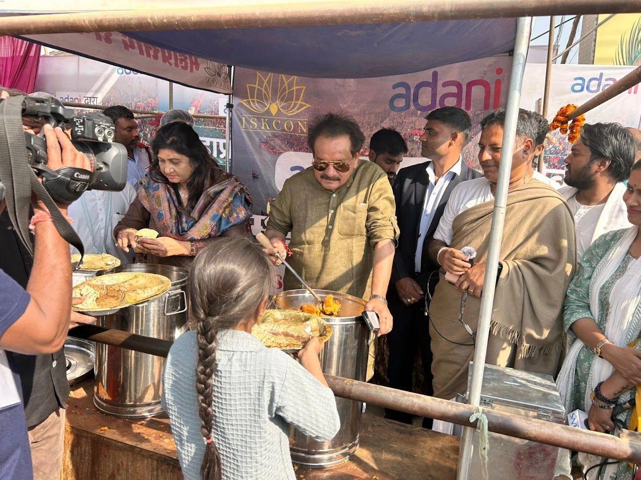 Minister SP Singh Baghel Serves Maha Prasad At Adani ISKCON Seva Camp During Maha Kumbh