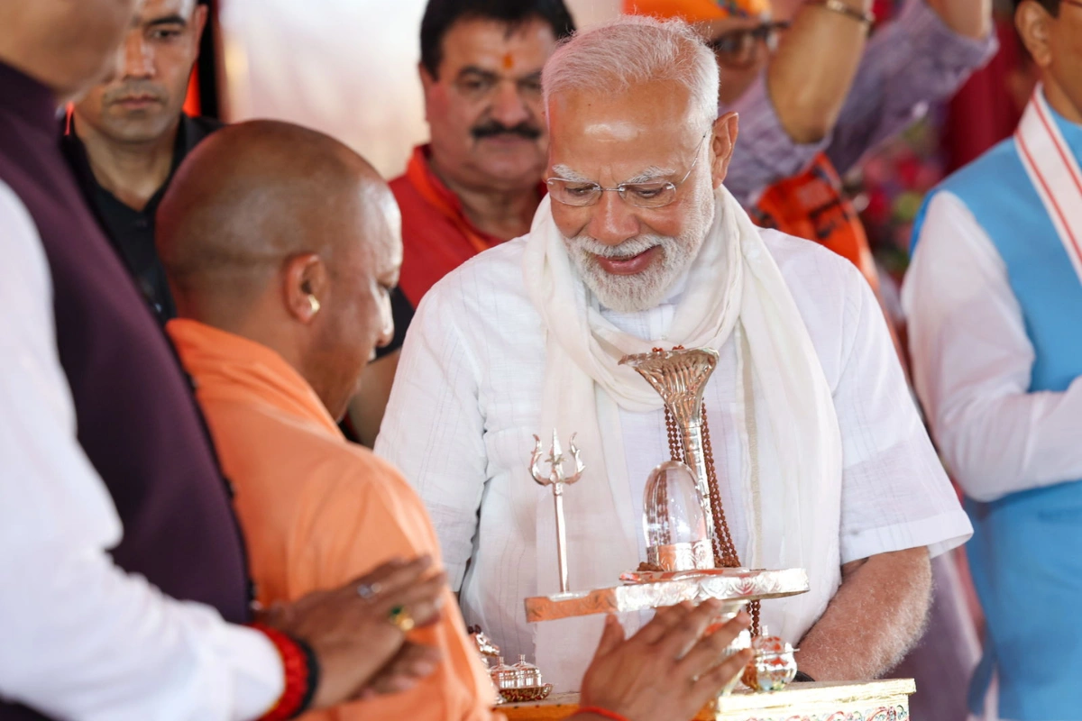 CM Yogi Adityanath Gifts Sacred Shivling Artwork To PM Modi During Varanasi Visit
